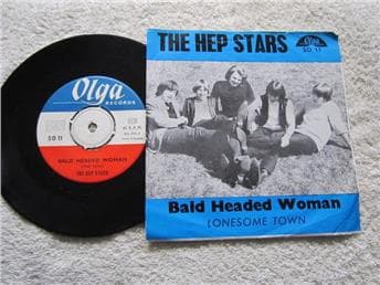 Hep stars balded headed woman